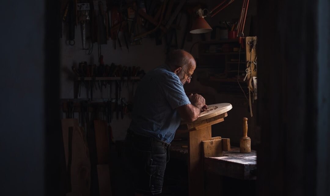 What Is the Difference Between Efficiency and Effectiveness? 3 Craftsperson producing quality work in a furniture workshop