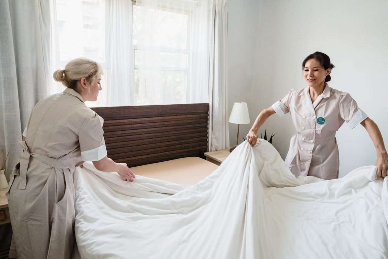 How Do You Identify the Root Causes of Low Productivity? 4 Hotel housekeeping team performing a standardized service process