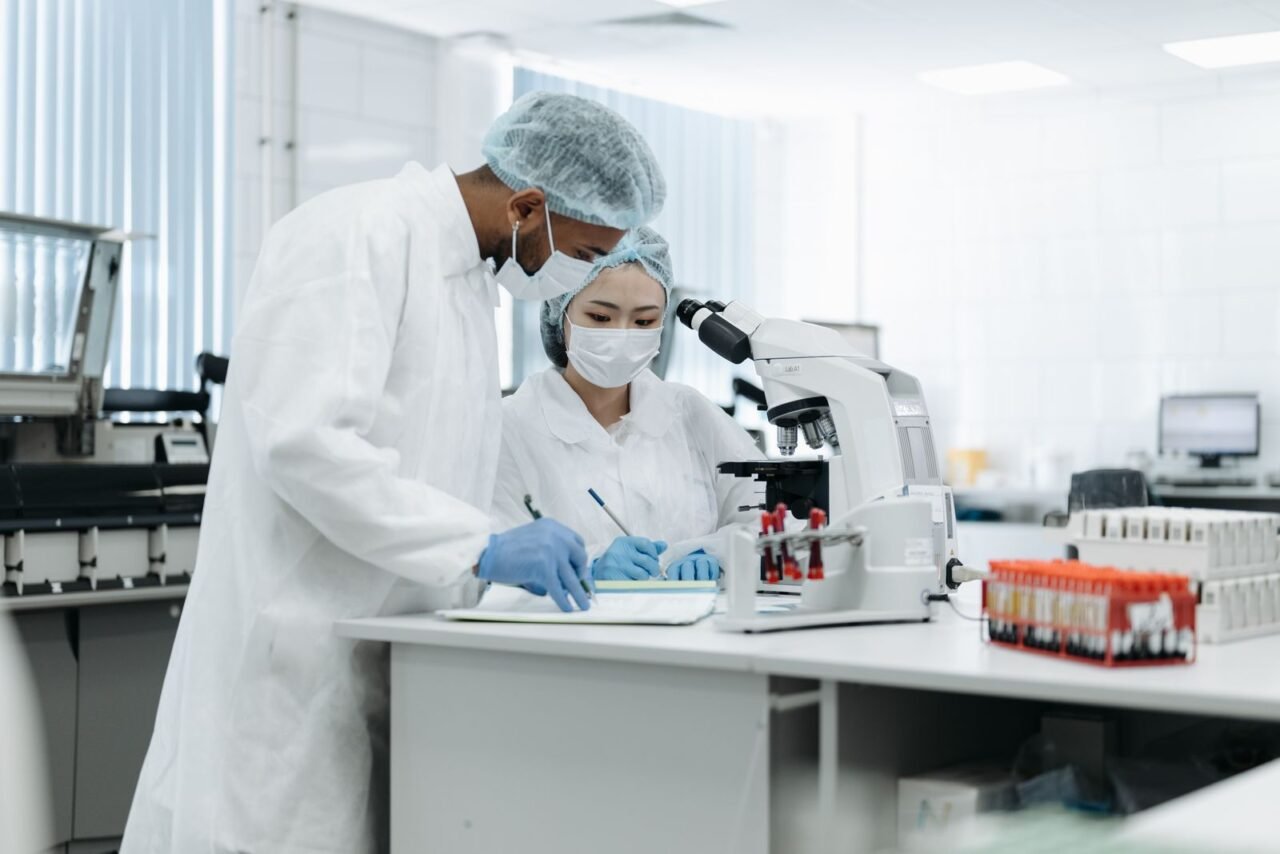 What Is Operational Excellence and How Is It Achieved? 4 Scientists testing a process in a quality control laboratory