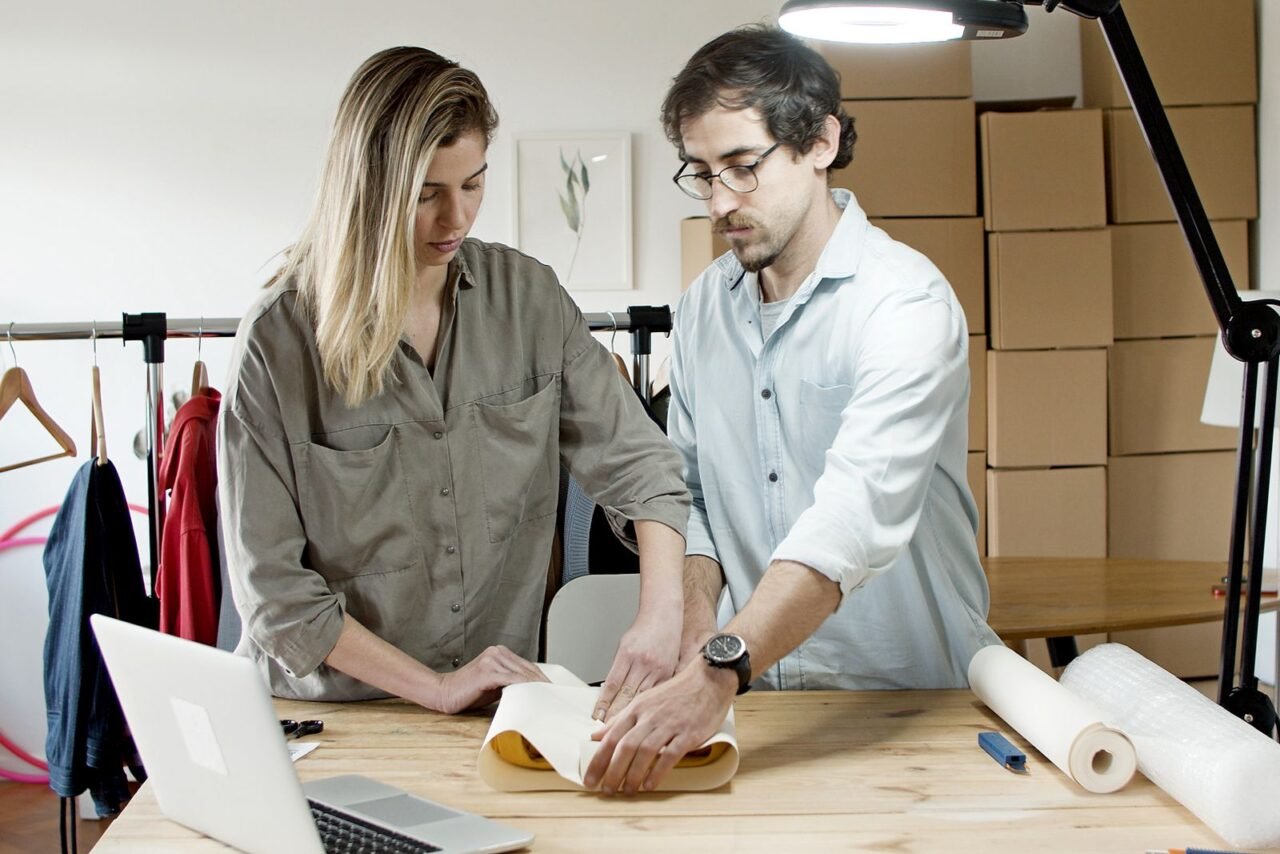 What Is Process Improvement and Where Should You Start? 4 Small business team packing online orders through a defined workflow