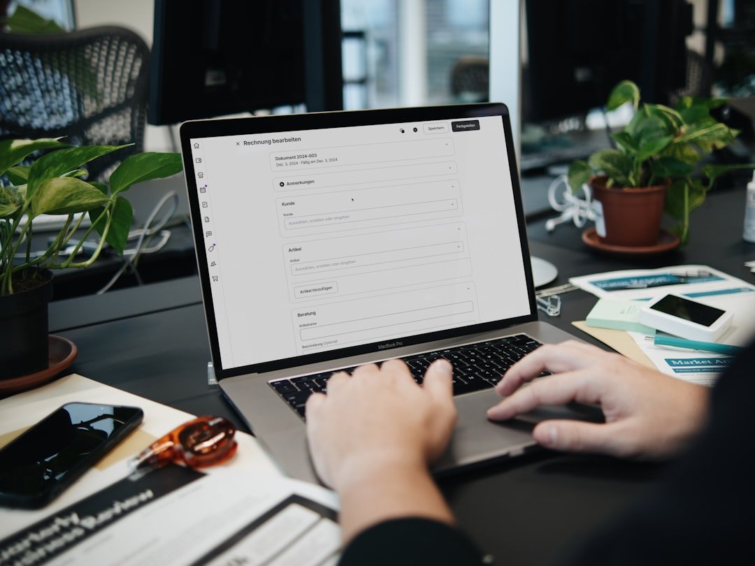 How Do You Build a Cost Reduction Strategy? 3 business owner reviewing recurring software and office costs