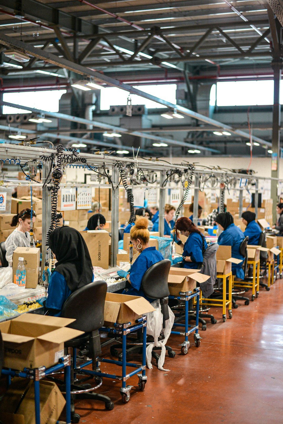 How Do You Build a Cost Reduction Strategy? 4 factory team improving value flow instead of making blanket cuts